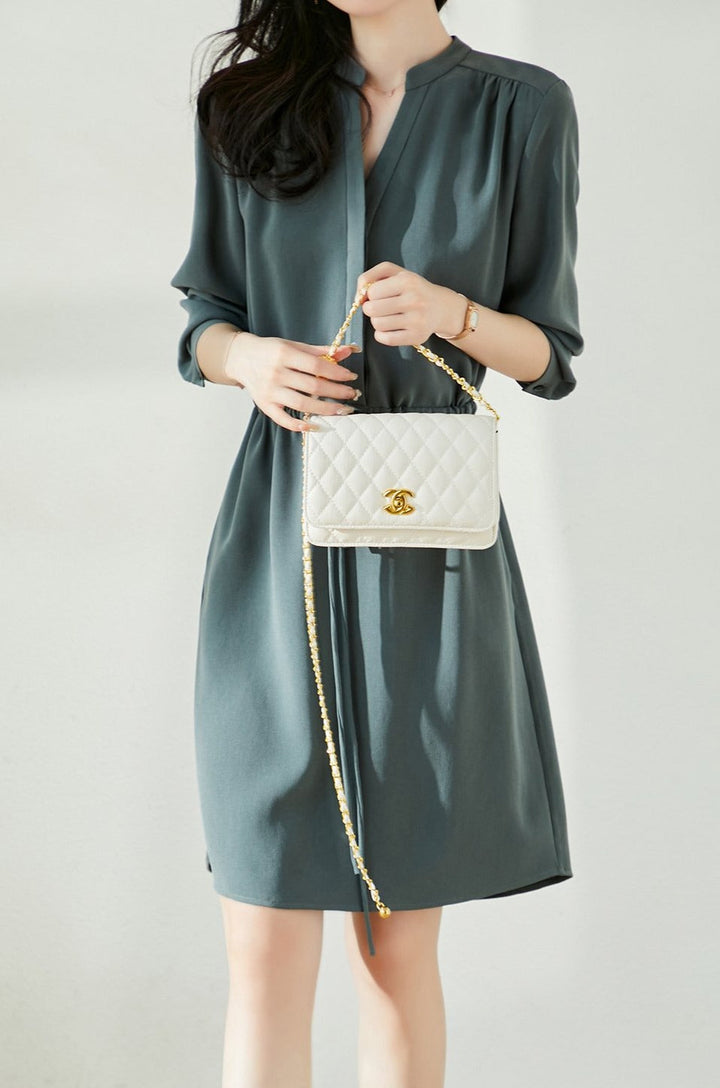 Skipper collar knee length dress with tie waist and pockets for women