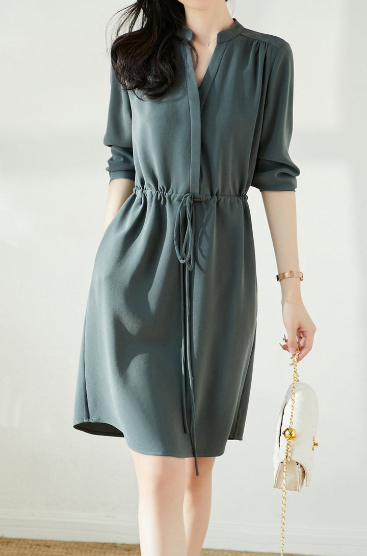 Skipper collar knee length dress with tie waist and pockets for women