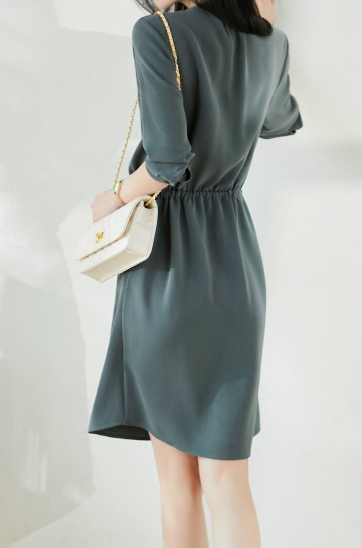 Skipper collar knee length dress with tie waist and pockets for women
