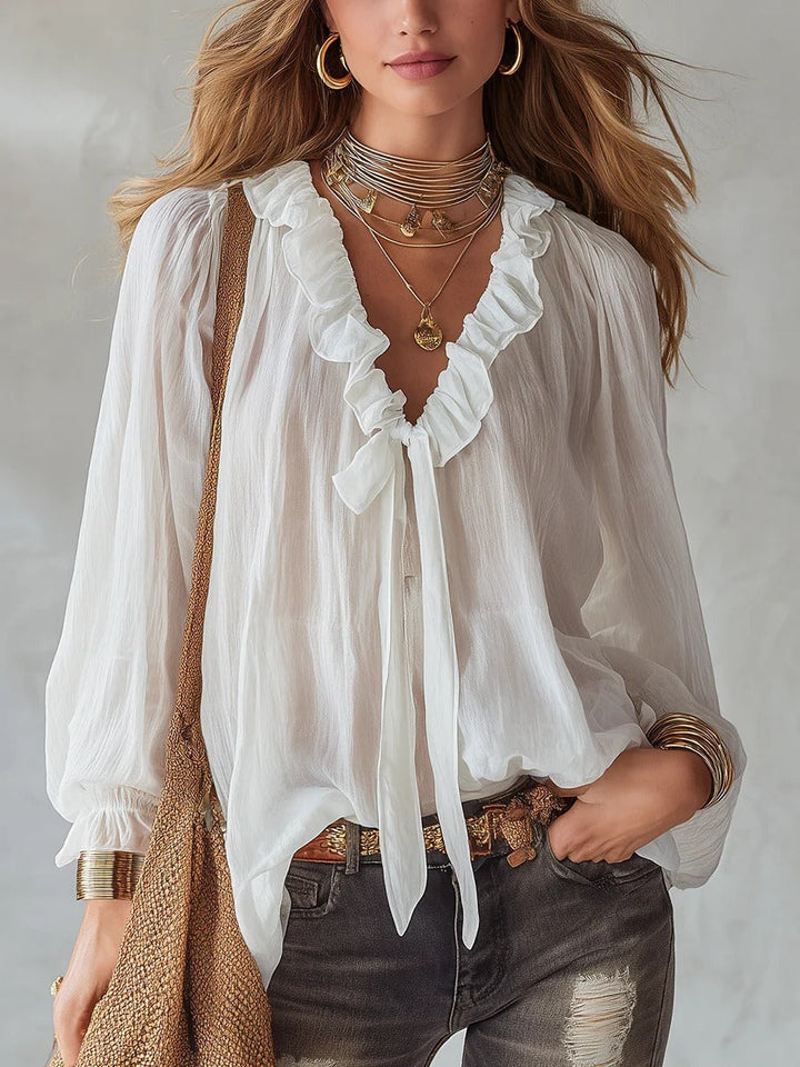Ruffle tie neck blouse with lantern sleeves and crinkle texture for women