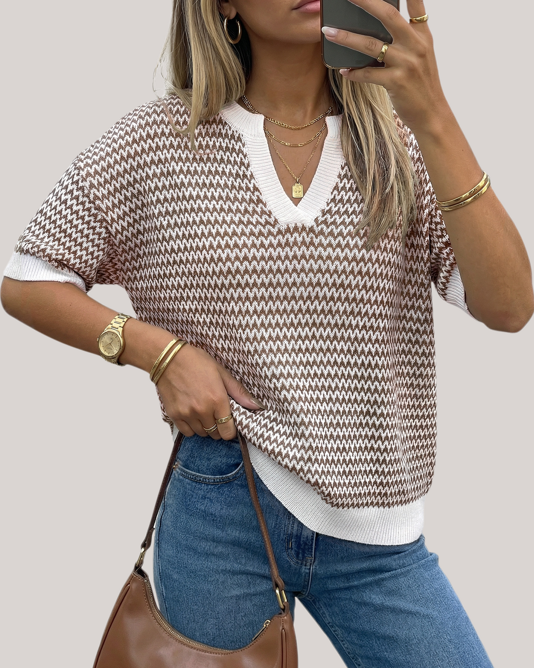 Striped cotton polo knit top with V-neck and short sleeves for women