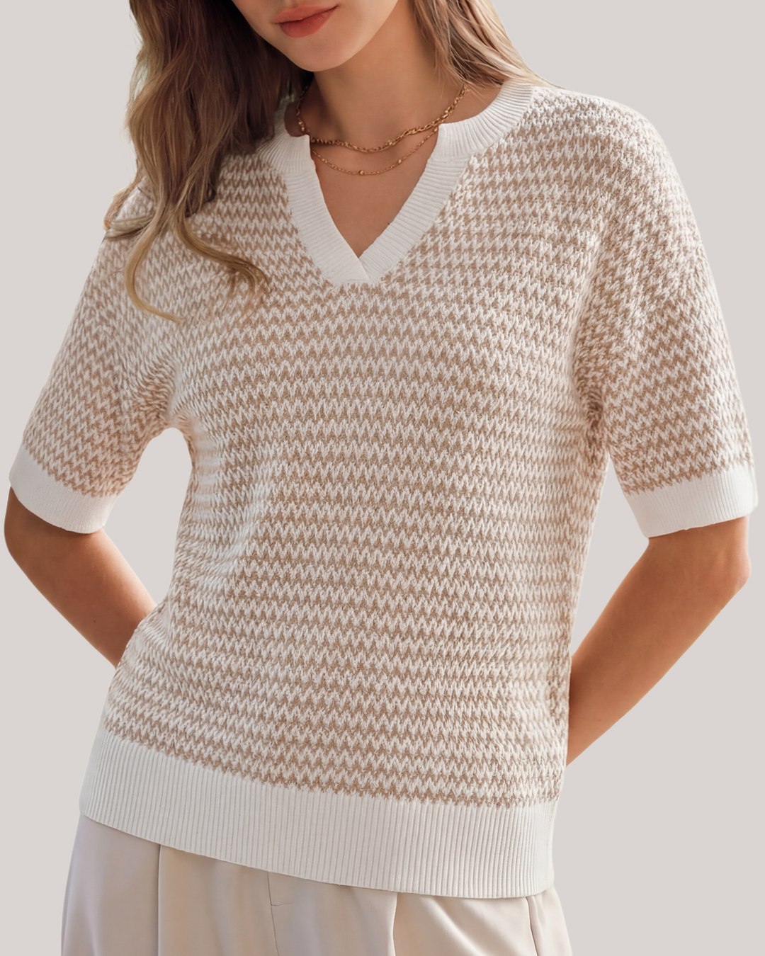 Striped cotton polo knit top with V-neck and short sleeves for women