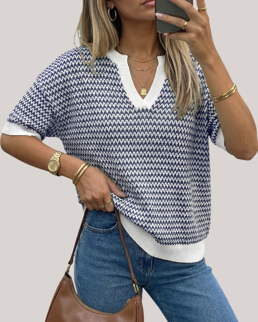 Striped cotton polo knit top with V-neck and short sleeves for women