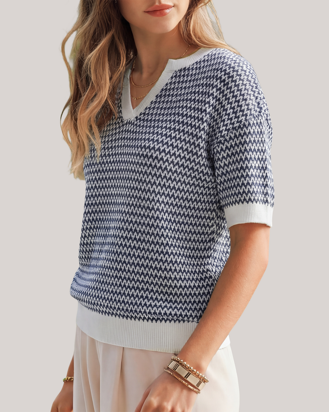 Striped cotton polo knit top with V-neck and short sleeves for women
