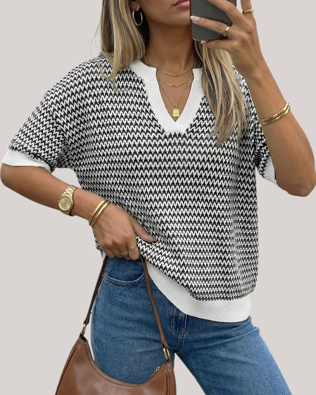 Striped cotton polo knit top with V-neck and short sleeves for women