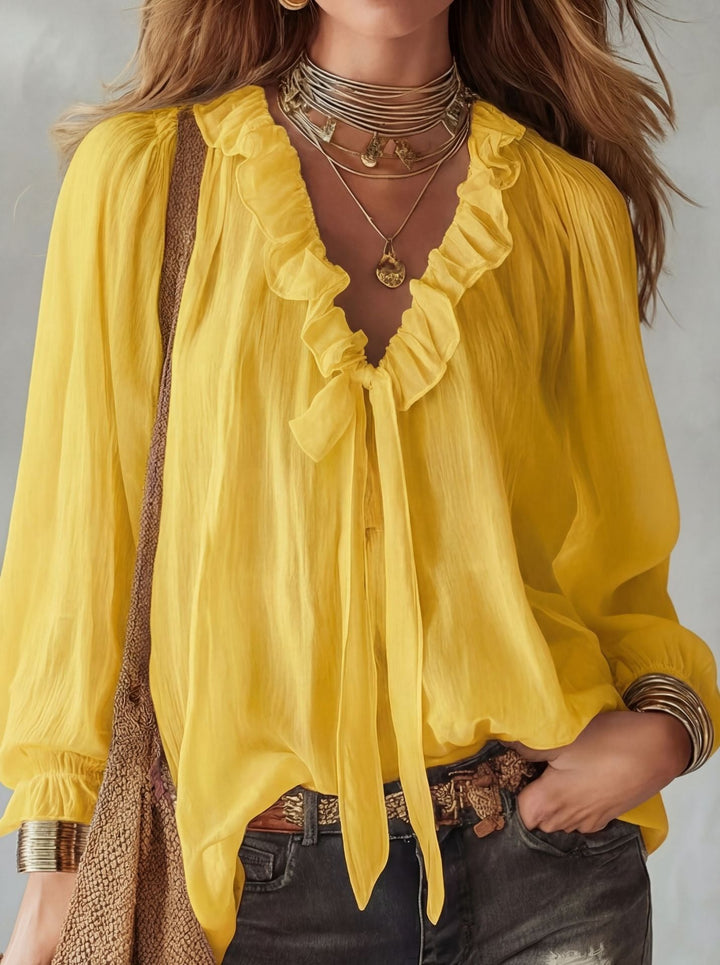 Ruffle tie neck blouse with lantern sleeves and crinkle texture for women