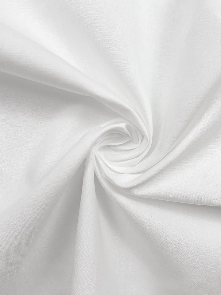 Cotton asymmetric shirt with split front and buttons for women