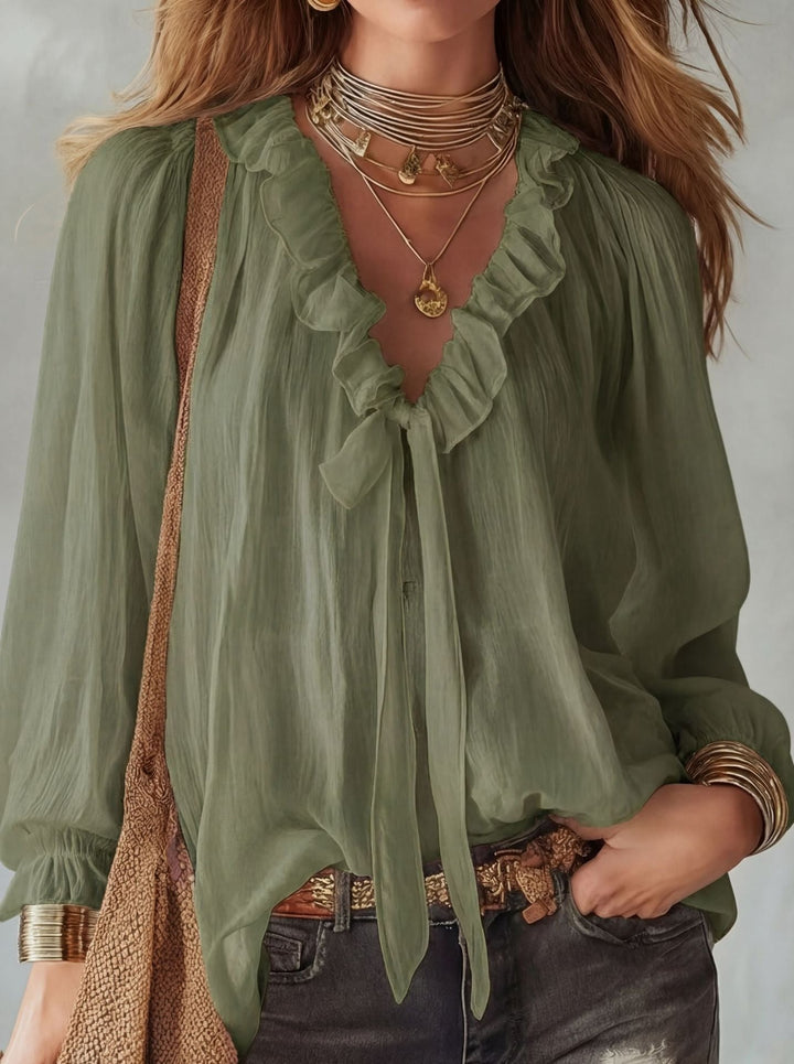 Ruffle tie neck blouse with lantern sleeves and crinkle texture for women