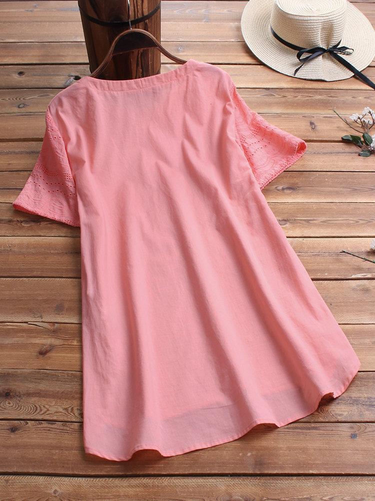 Cotton eyelet tunic top with button detail and short sleeves for women