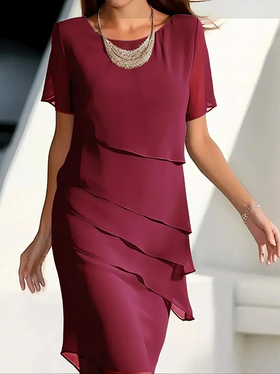 Layered dress with simple, elegant lines for women