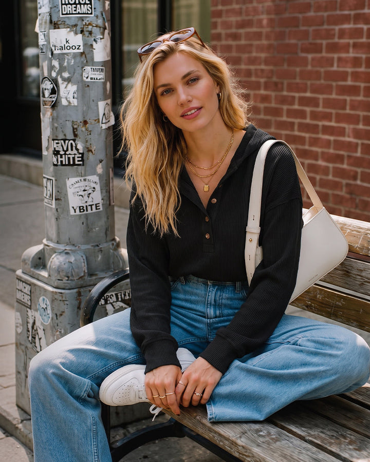 Ribbed collared oversized sweatshirt with button placket for women