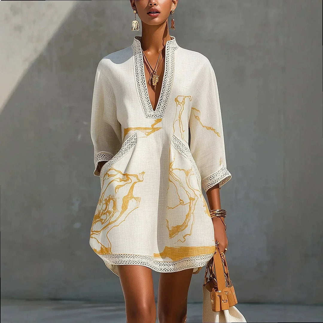 V-neck mini dress with trim detail and flowing fit for women