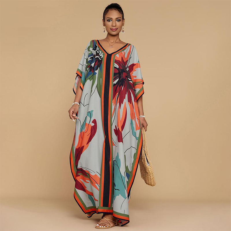 Printed kaftan maxi dress with V-neck and batwing sleeves for women