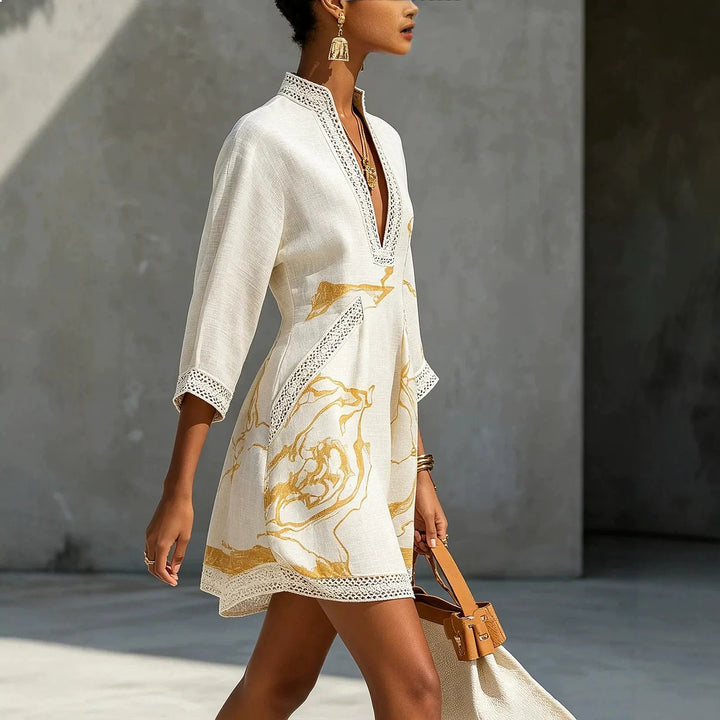 V-neck mini dress with trim detail and flowing fit for women