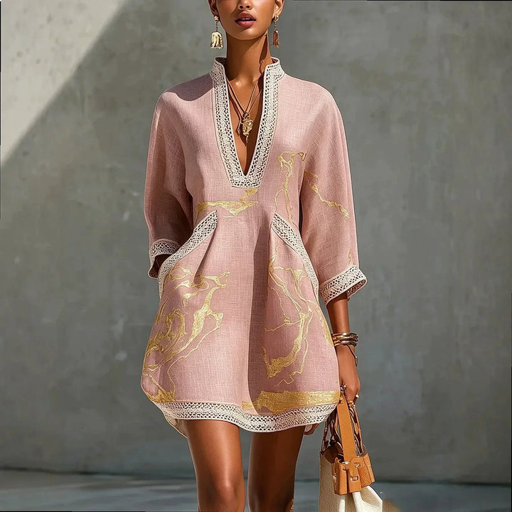 V-neck mini dress with trim detail and flowing fit for women