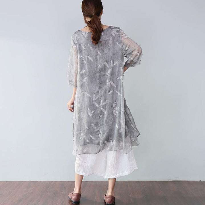 Plus size feather print linen blend dress with half sleeves for women