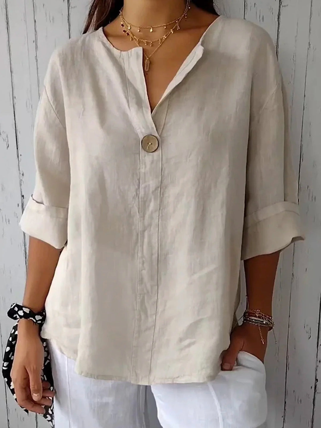 Cotton V-neck blouse with button detail and 3/4 cuffed sleeves for women