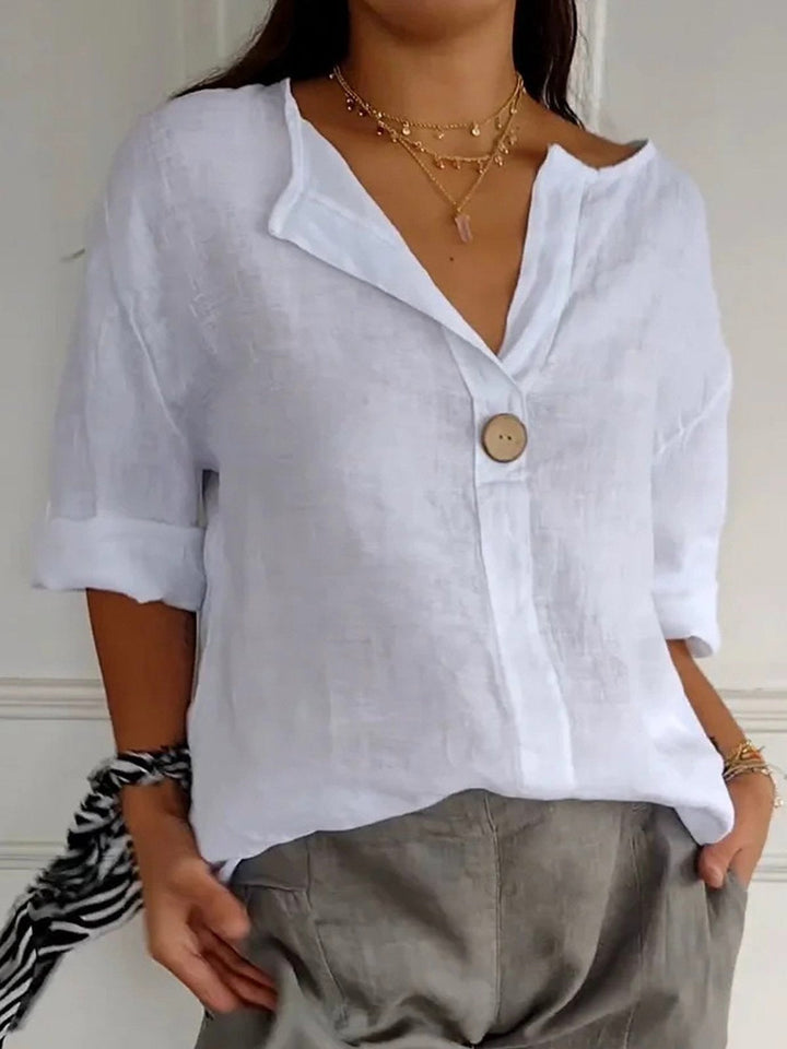 Cotton V-neck blouse with button detail and 3/4 cuffed sleeves for women
