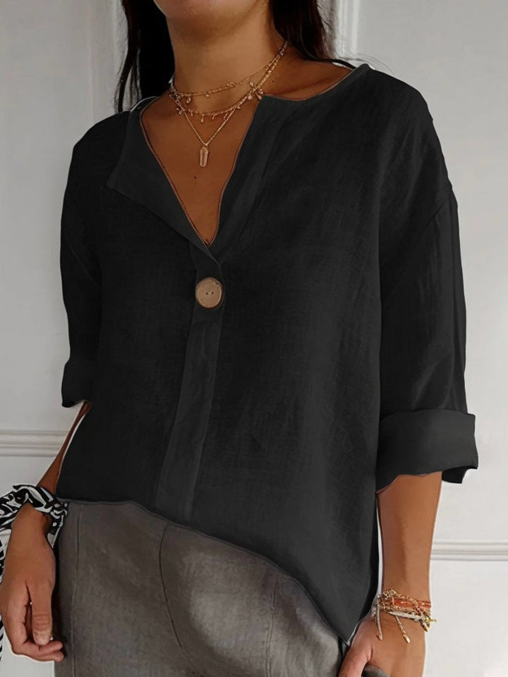 Cotton V-neck blouse with button detail and 3/4 cuffed sleeves for women
