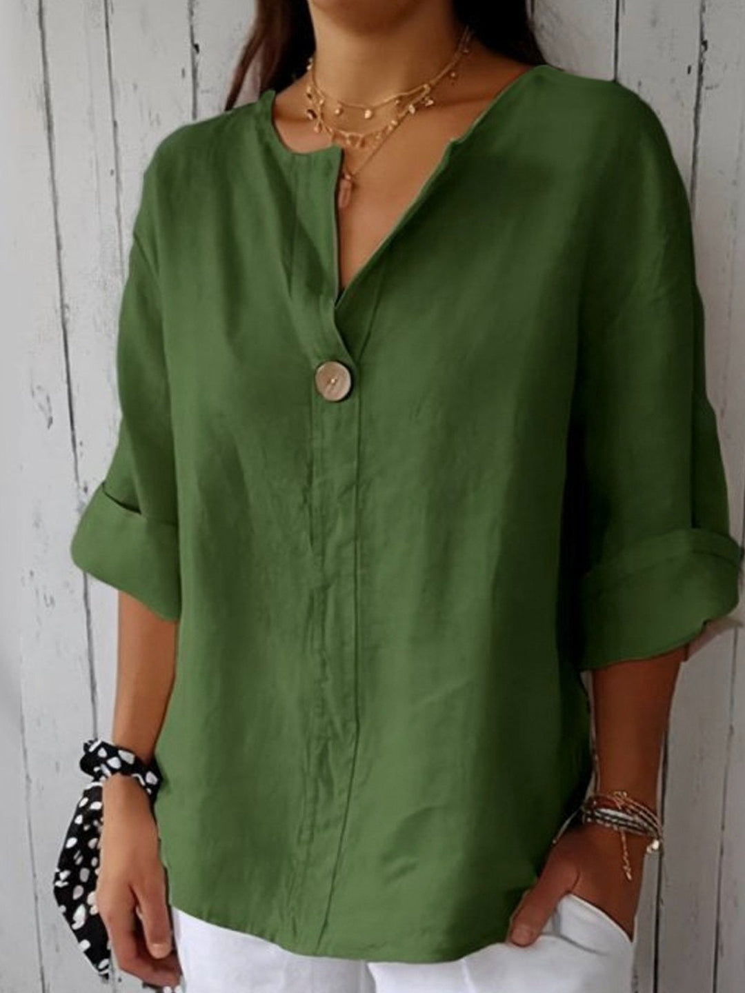 Cotton V-neck blouse with button detail and 3/4 cuffed sleeves for women