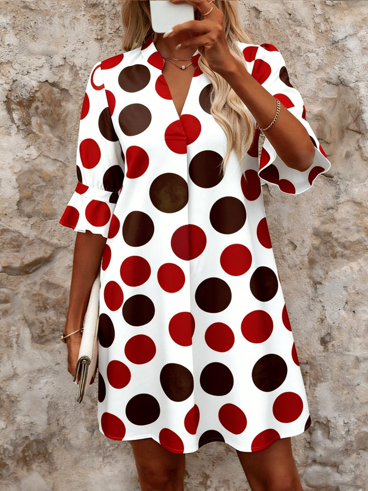 Polka dot mini dress with collared V-neck and ruffled 3/4 sleeves for women