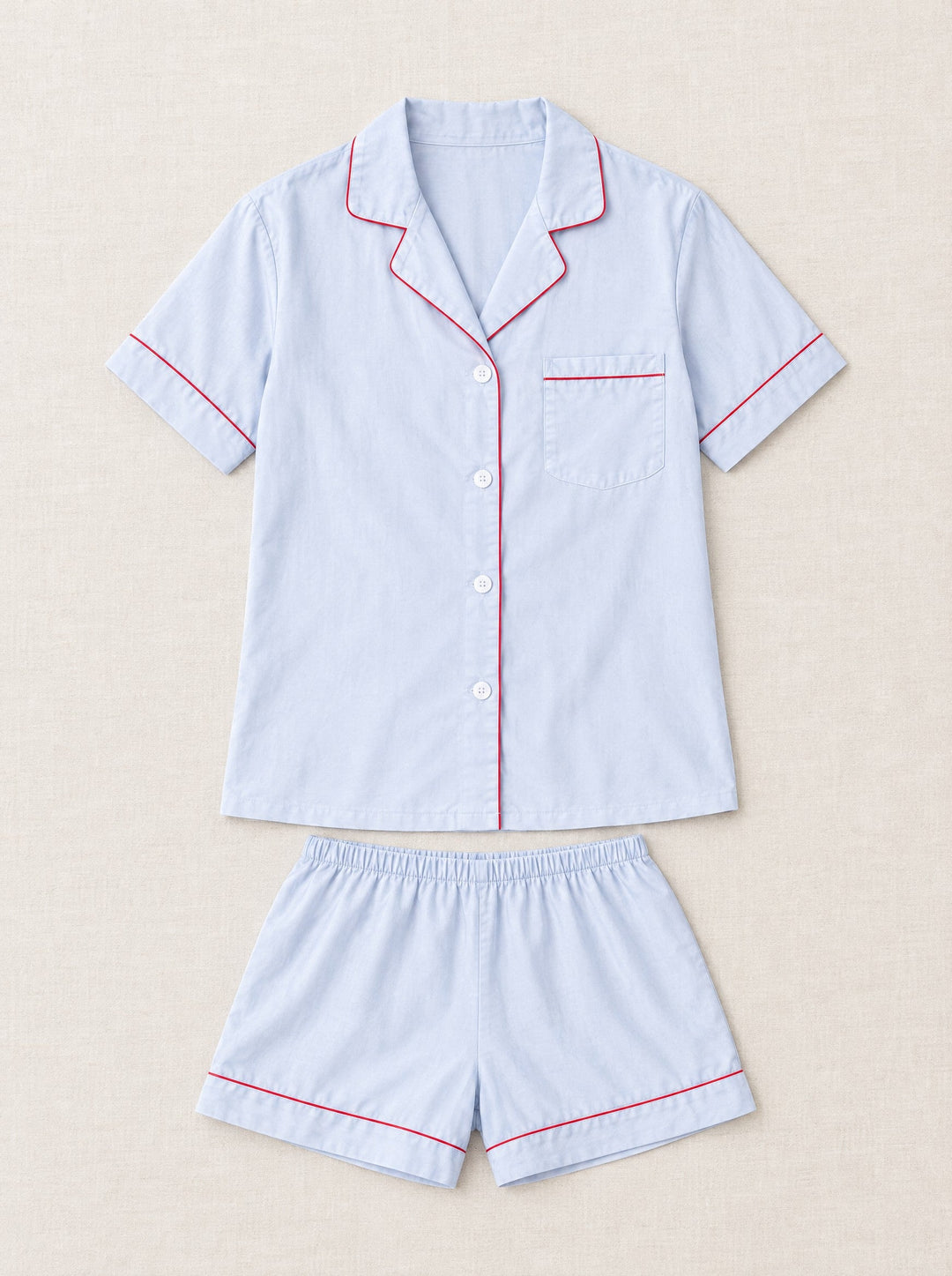 Lyocell short pyjama set with piping in light blue, flat lay