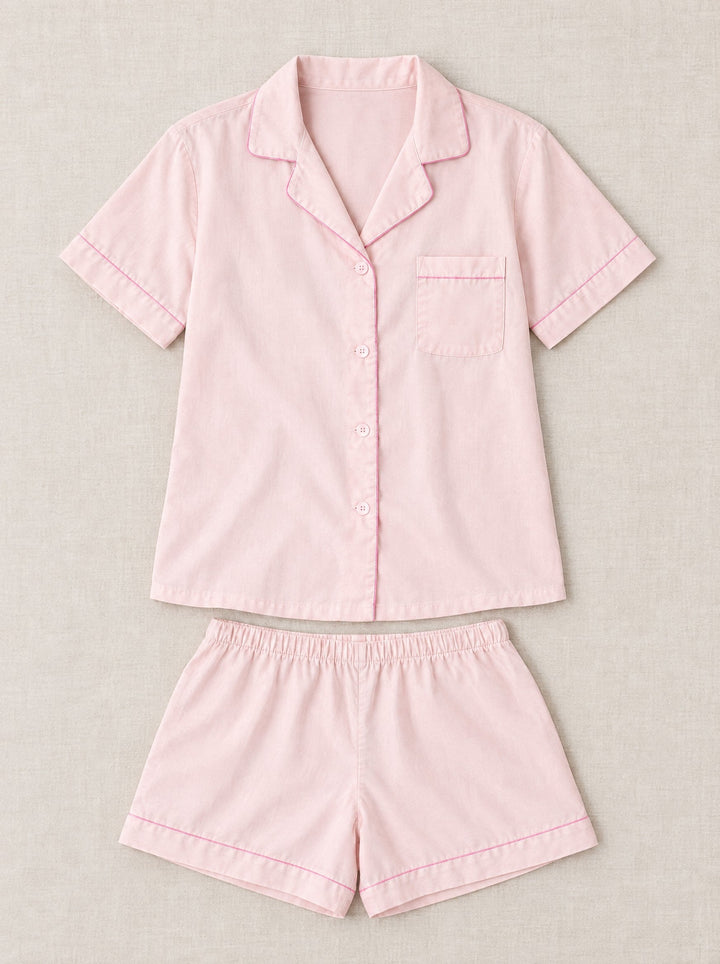 Lyocell short pyjama set with piping in pink, flat lay
