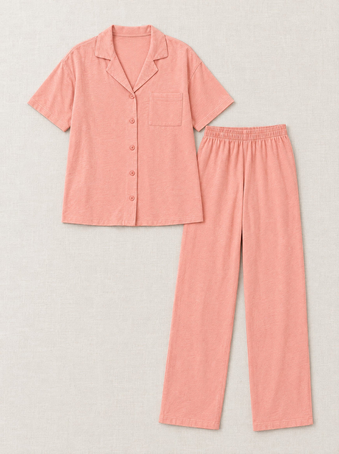 Modal-cotton pyjama set in coral, flat lay