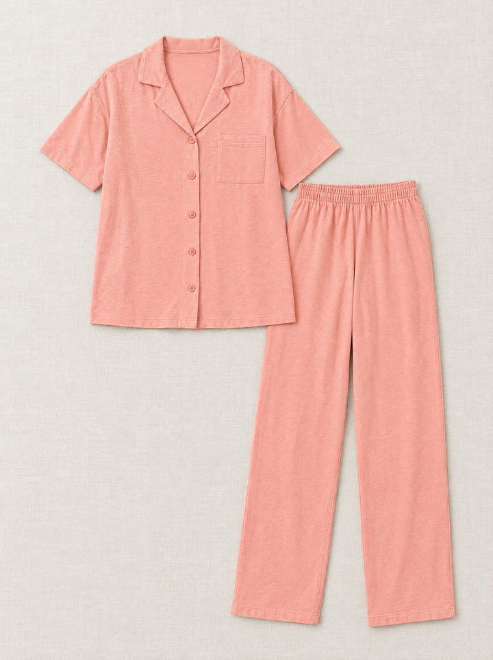Modal-cotton pyjama set in coral, flat lay